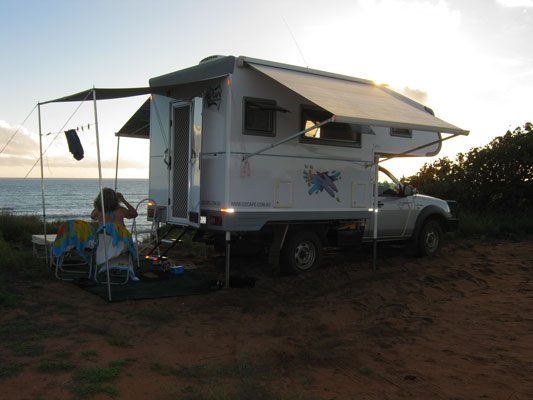 Ozcape Campers Slide-On Optima camped overlooking the sea