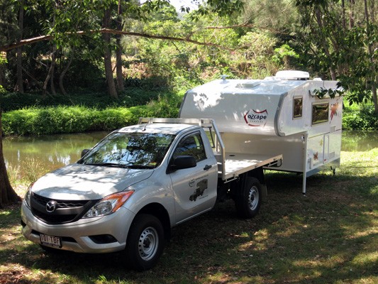 Ozcape Campers Slide-On Optima camped by the creek