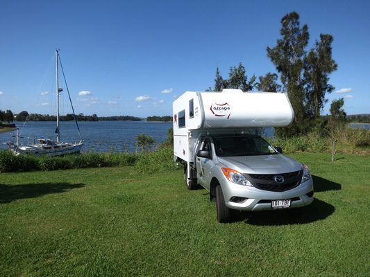 Ozcape Campers Slide-On Optima camp by the water