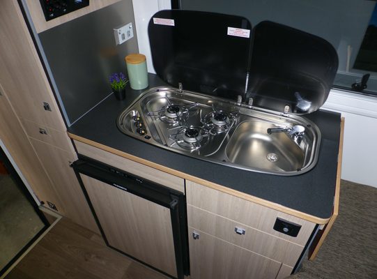 Ozcape Slide-On camper Woondabaa kitchen with 3-burner cooker and sink