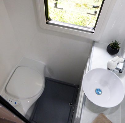 Ozcape Campers Slide-On Optima bathroom with shower, vanity and toilet