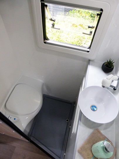 Ozcape Campers Slide-On Optima bathroom with shower, vanity and toilet