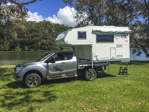 Showcase of Slide-On concept. Loading of Ozcape Slide-On onto extra cab Mazda BT50. Very easy with remote controlled electric jacks.