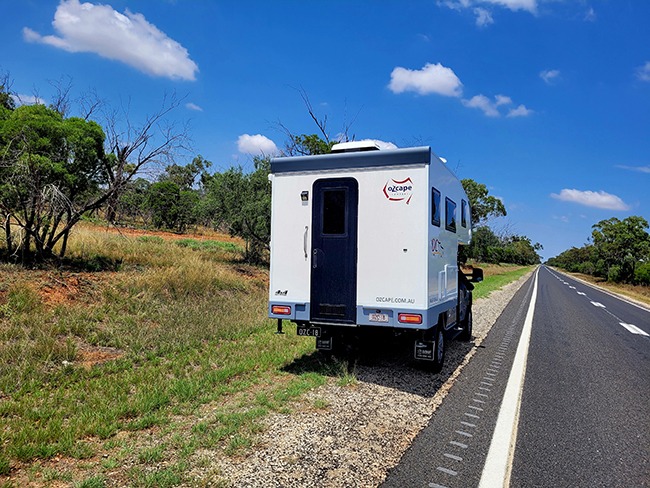 Ozcape camper on tour. Coffee break on the side of a country road.